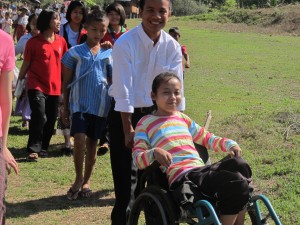 This is one of the baptismal candidates. She was abandoned by her family and left to die, when someone brought her to our school. She has suffered from arthritis all her life and cannot walk, but praise the Lord, she has chosen to serve God! Even though she has suffered alot, she always has a smile on her face!