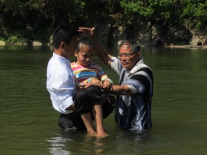 Here is KayGee, the crippled girl, getting ready to be baptized.