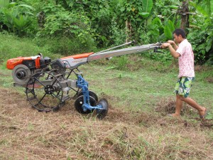 Tilling the soil for a new garden site.