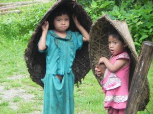 Some children that came to see us. What are these children wearing? Karen umbrellas. They are made out of bamboo stripes and palm leaves. Very cleaver!
