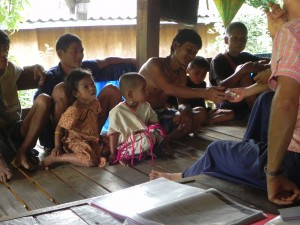 Many villagers waiting to be treated for their sickness.