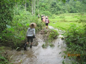 Through muddy, swamped trails.