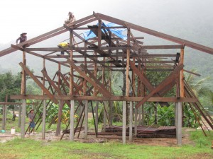 A closer look at the boy's dorm on the right. They are getting closer to getting ready to put the roof on!