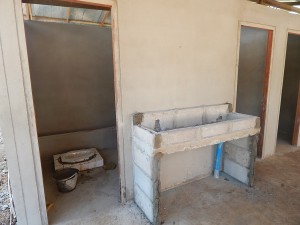 The toilets and sinks are almost finished.