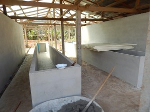 The water tanks for bathing and washing clothes.