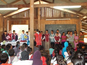 After the sermon, Pastor Shim goes over the baptismal vows with the students.