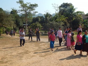 Then we all walk to the Moei River for the baptism.