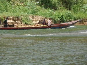 The loaded boat is now on its way down the river to our school.