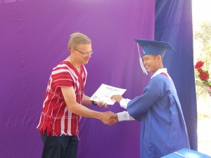 Now the students receive their diplomas.